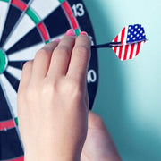 A person holding a steel tip dart, ready to throw at a dartboard.