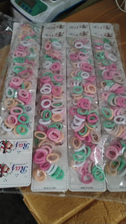 Assorted colorful fabric-covered elastic hair bands for children