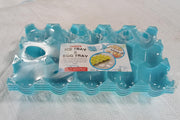 Overhead view of a 4-pack of plastic egg trays, perfect for bulk storage.