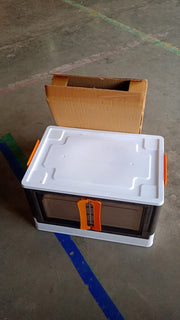 Plastic wardrobe storage container in black and white colors designed for easy organization