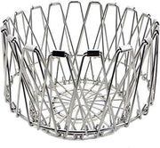 Multipurpose stainless steel wire basket transformed into a stylish fruit bowl for dining.