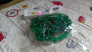 Close-up of the elastic rope material and metal clips.