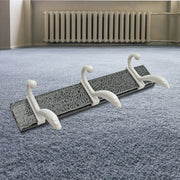 Minimalist GlimmerHome wall mounted coat rack holding a dog leash and jackets