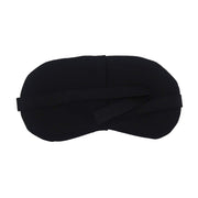 Side view of a sleep mask for travel, showing the adjustable elastic strap for a secure fit.