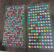 Brightly shimmering self-adhesive decorative shining stone stickers on display.