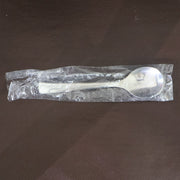 Dining spoons placed on kitchen table highlighting ergonomic design