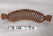 Compact plastic banana cutter with comfortable grip for daily use.