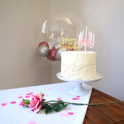 The luxury birthday candle set arranged beautifully on a cake, acting as an eye-catching topper for special events.