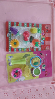The set of fancy erasers presented in their appealing packaging, ideal for gifting or retail display.