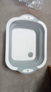 Dimensions of the foldable chopping board, illustrating its compact design.