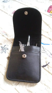 A full display of the professional Nail Care Kit's multiple high-quality tools.