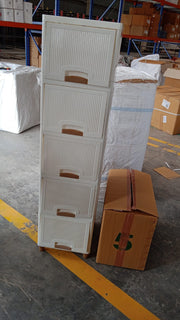 Plastic storage drawer cabinet placed in a home office setting for stationery storage