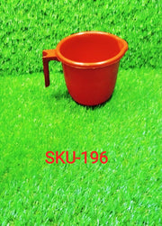 Stack of colorful Bathora plastic bathroom mugs, demonstrating their compact design.