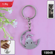 Close-up of Jai Shri Ram Keychain showing intricate cut-work and metal finish.