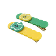 Side view of colorful apple design hair clip holding hair gently hair accessories