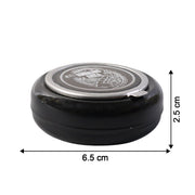 Tabletop ashtray showing deep container for ash collection