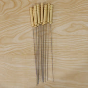 Skewers with stainless steel sticks and wooden handles for grilling cooking