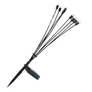 Solar LED fiber optic strands glowing brightly in outdoor setting