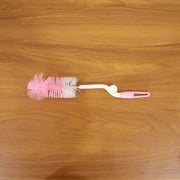 Bottle cleaning brush in use with 360 degree rotary handle