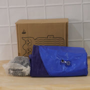 Inflatable car bed setup with cushions, ready for camping or travel