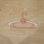 Multi-color children's hanger for nursery organizing