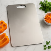 Front view of stainless steel cutting board ideal for vegetables and fruits