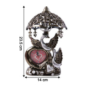 Decorative table lamp with swan couple design and clock