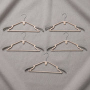 Sturdy plastic clothes hangers for daily wardrobe use