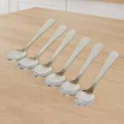 Close-up view of stainless steel dining spoons highlighting their sleek design