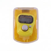 Close-up of digital finger tally counter button and screen during use