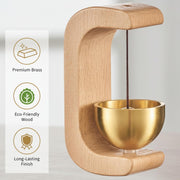 Zen meditation bell with wooden stand in cozy home setting