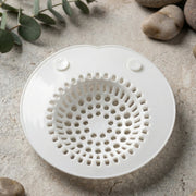 Flexible sink drain cover in bathroom or kitchen