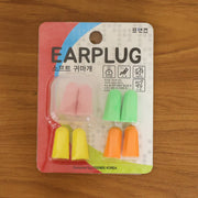 Soft foam earplugs stored in a portable case for cleanliness and organization