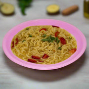 Six vibrant mini soup plates arranged neatly for serving.