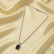 Side view of men's durable stainless-steel pendant chain with black pendant