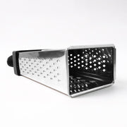 Fine and coarse grater surfaces of stainless steel 4-in-1 grater with handle