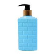 Plastic soap dispenser bottle placed on countertop