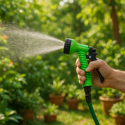 Side view of handheld garden hose spray nozzle for watering and cleaning