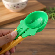 Ice cream scooper with ergonomic handle and a vibrant red scoop.