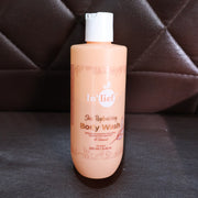 Hydrating body wash bottle resting on a bathroom surface
