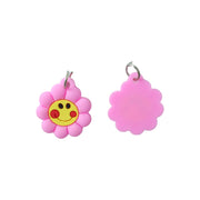 Flower smiley bag charm with playful design