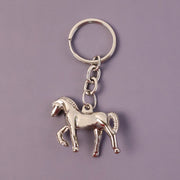 Stylish chrome horse shape keychain attached to key ring