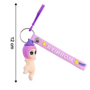 Size comparison showing compact baby doll silicone keychain