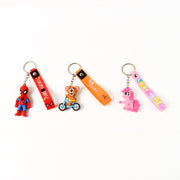 Detailed view of the metal hook and silicone strap on a cartoon silicone keychain.