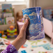 Side view of sturdy metal coin box with princess theme.