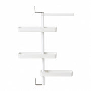 Rotating storage rack filled with kitchen items demonstrating storage capacity