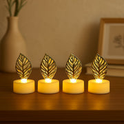 Close-up of a single golden leaf LED candle showcasing its textured design and warm glow.