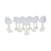 Decorative table light featuring translucent crystal-cut shade