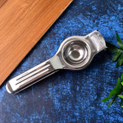 Manual steel lemon juicer showing ergonomic handles for comfortable grip