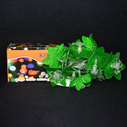 Festive multi-color Leaf & Flower LED Decorative String Light illuminating a home wall